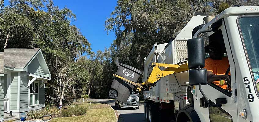 Cumberland Services Automatic Side-Loading truck in action.