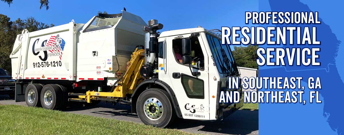 Cumberland Services automatic side-loading waste and recycle truck.