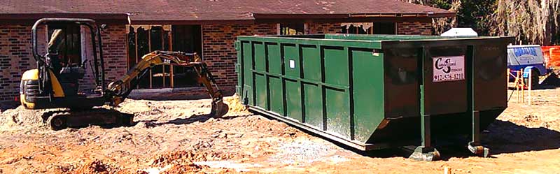 Cumberland Services temporary roll-off container/ dumpster on construction site.